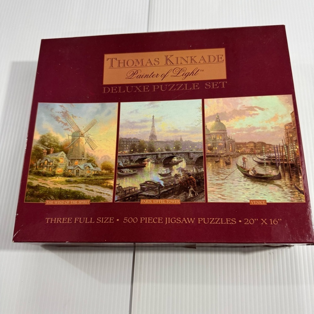 29. Thomas Kinkade Deluxe - 3 full size 500 piece Puzzle Set with Scenic Designs